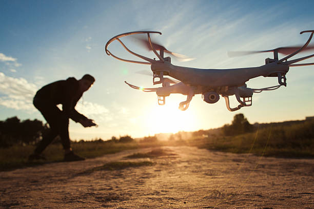 pilot flying a drone