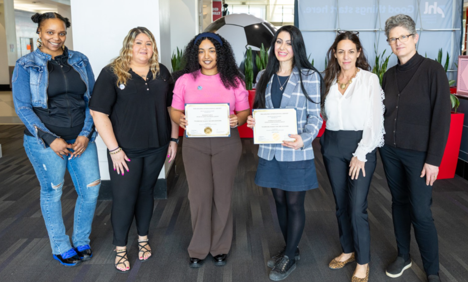 Asimena Patsaros and Beimnet Kifle Receiving Award