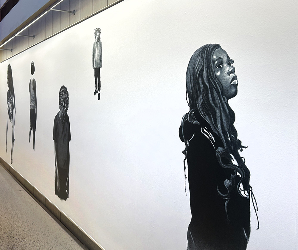 black and white charcoal drawing of black children