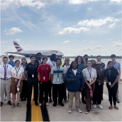group of interns on airfield