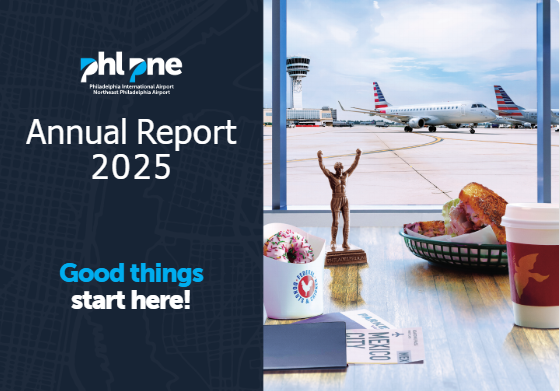Annual Report 2025. Good things start here. on dark blue map background with airfield photo next to it. Tower and American Airlines plane. On a table is a mini Rocky statue, Federal Donuts donut and LaColome coffee cup